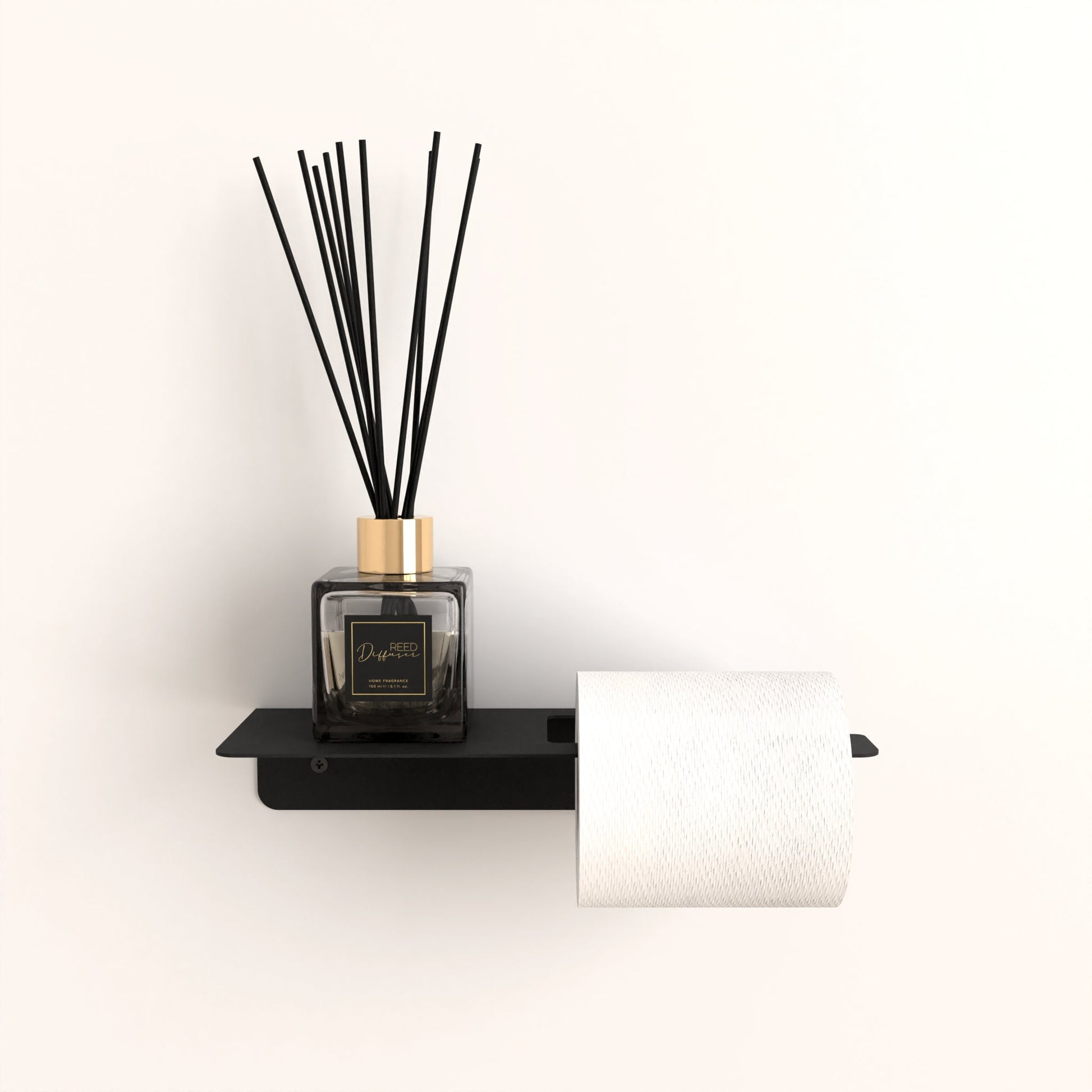 Black metal toilet paper holder, golden-capped fragrance diffuser, bathroom shelf, minimalist design.